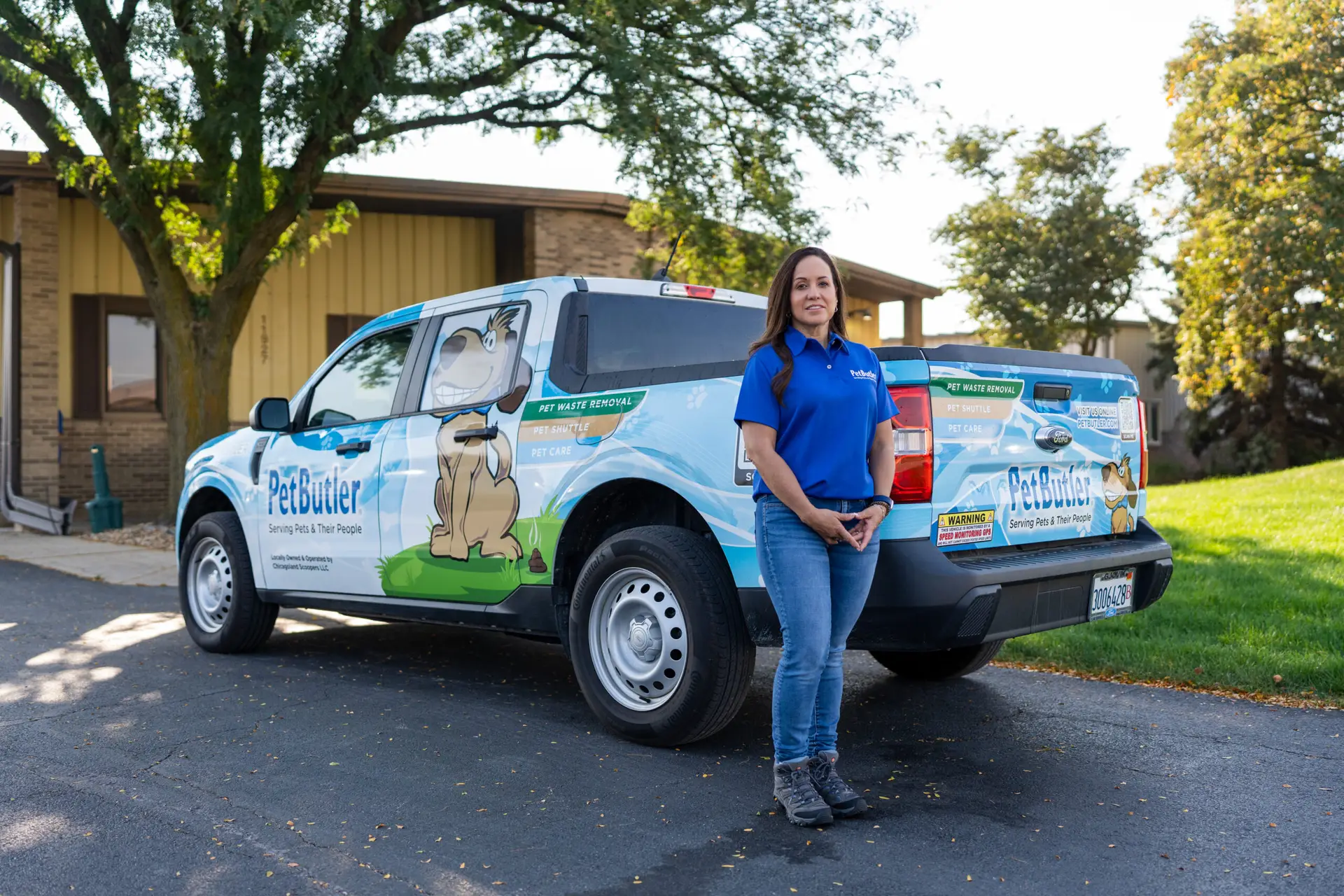 Women - Tamara Vennen in front of Pet Butler Truck for her owner truck shot.