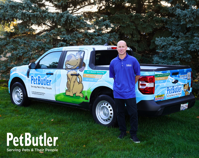 Pet Butler Franchise Owner standing in front of their Pet Butler truck.