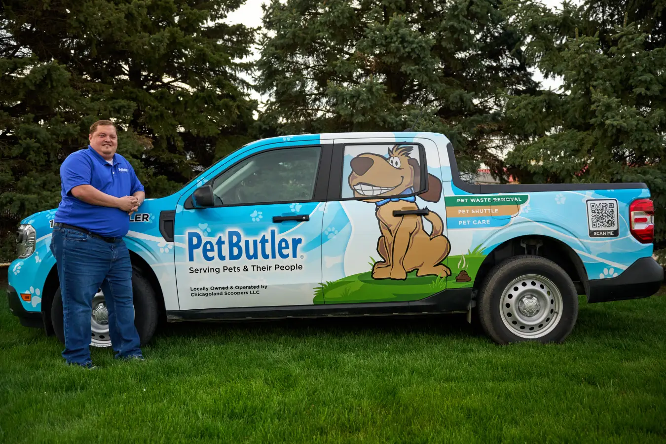 Pet Butler Franchise owner Rob Moore standing in front of Pet Butler truck.